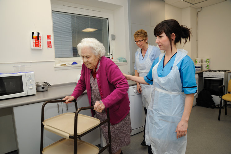 Occupational Therapists at work with a patient