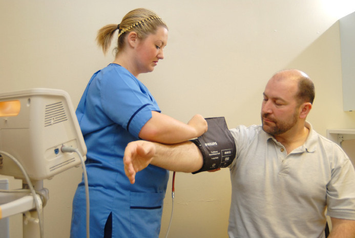 nurse removing cuff