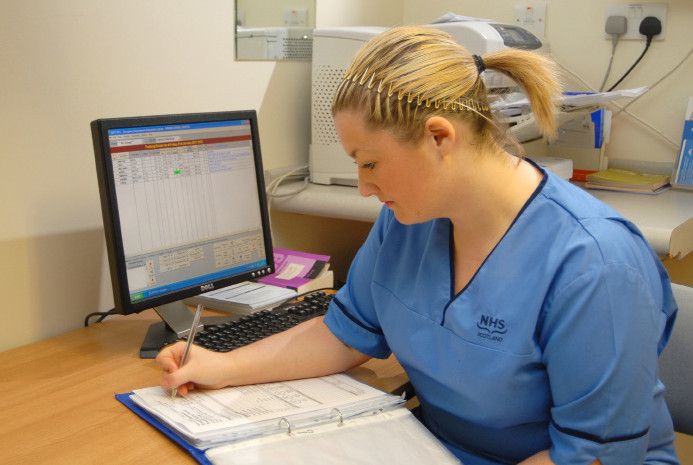 nurse making notes