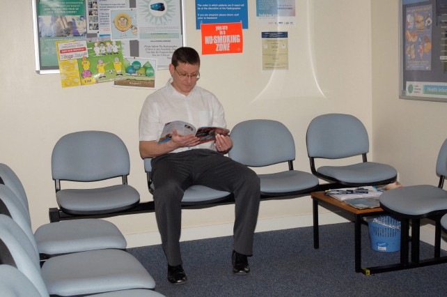 a person sitting in a waiting room