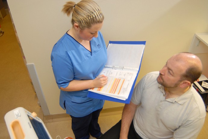 Patient talking to a nurse