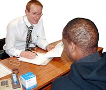 a doctor talking to a patient