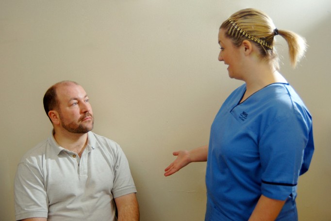 nurse talking to patient 