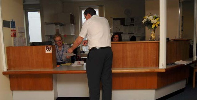 a patient at reception