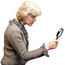 a person holding a magnifying glass