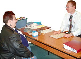 a doctor talking to a patient