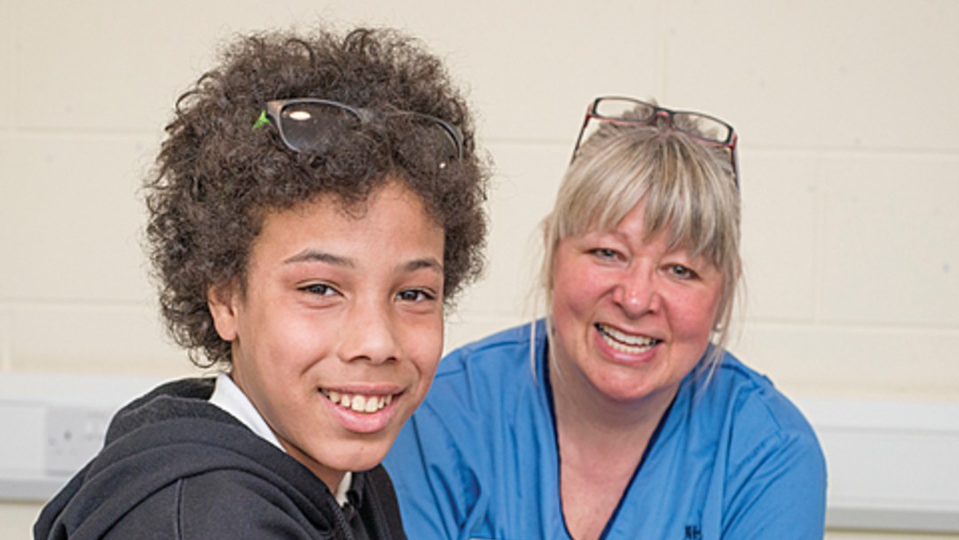 Image of school nurse with recruit