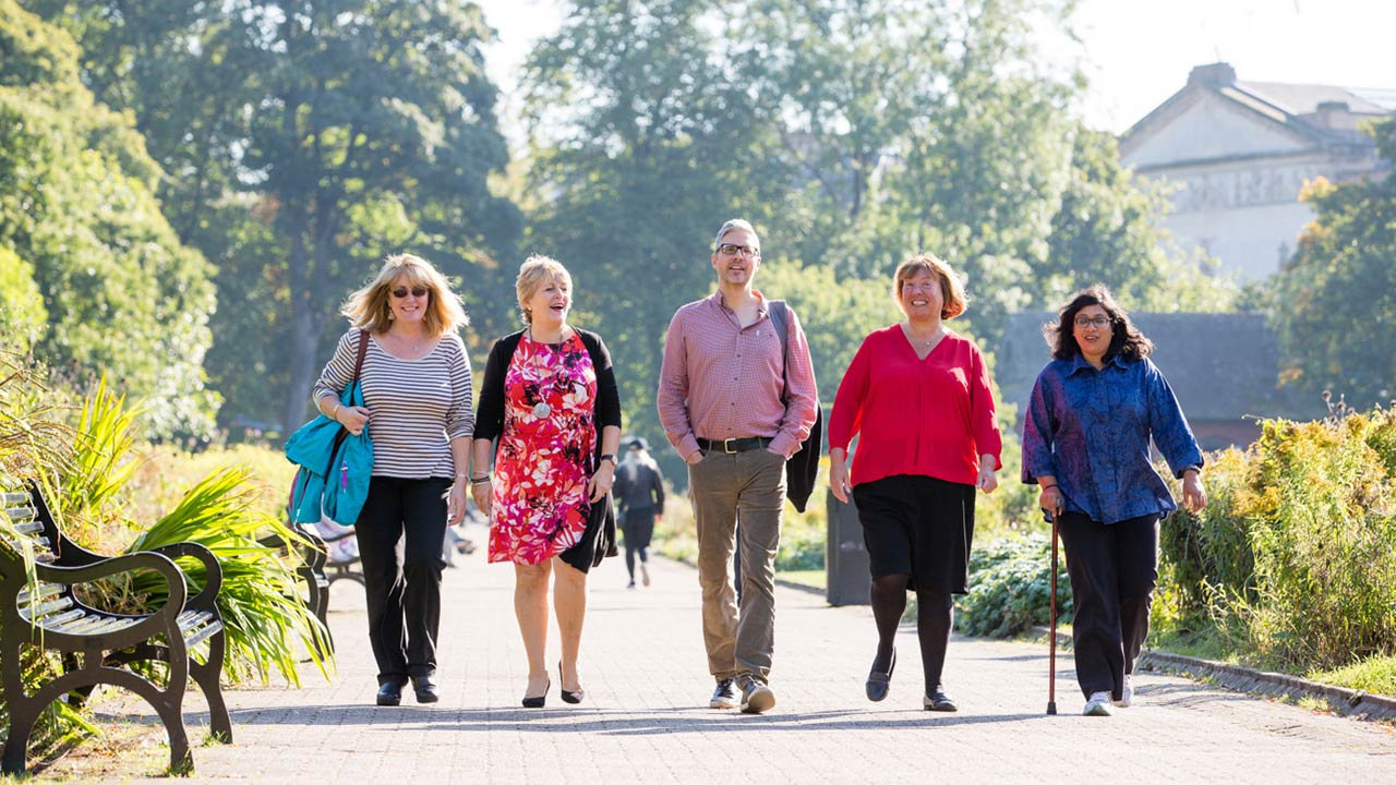 eople walking and smiling