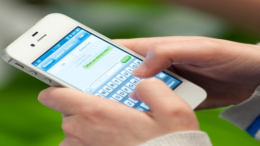 Image of service user accessing iphone