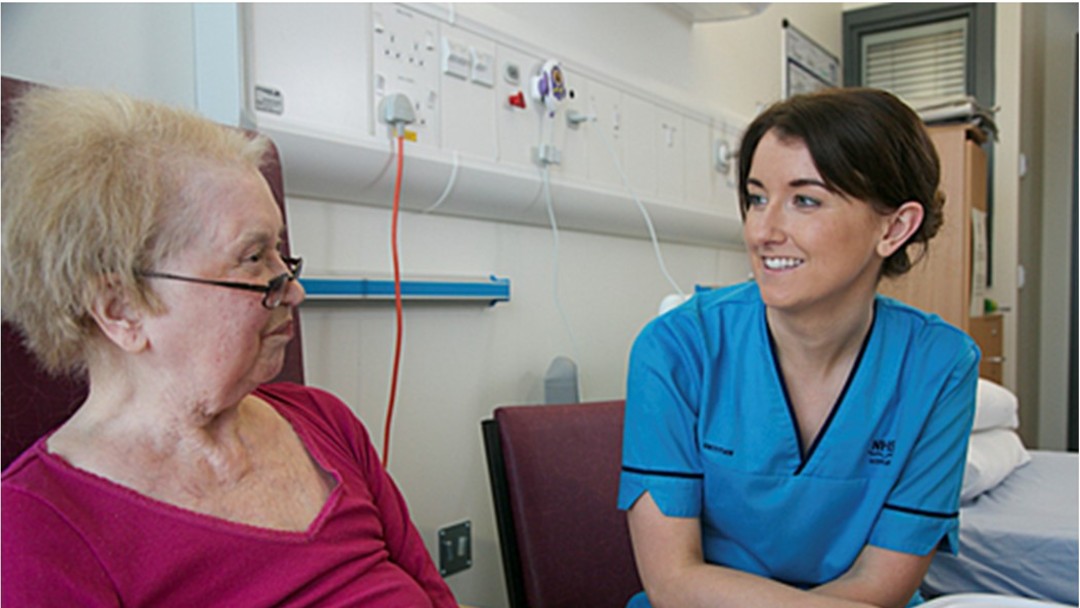 Nurse consulting with patient