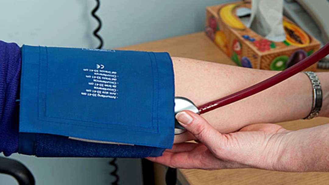 Image of patient getting blood pressure check