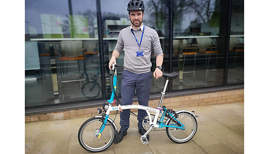 NHS Staff member with bike