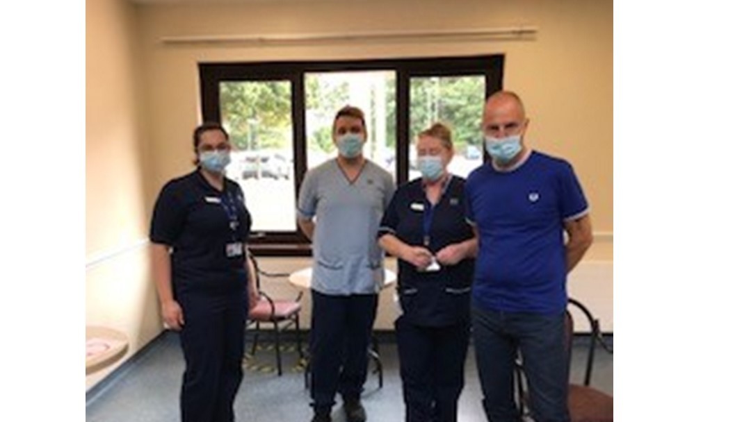 Image of staff from Udston Hospital and Empire Bar patron Colin McNab