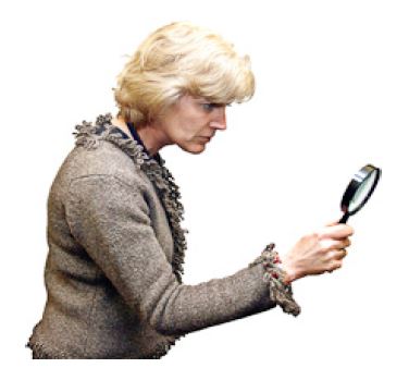 person holding a magnifying glass