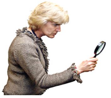 a person holding a magnifying glass