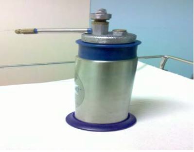 a metal container with a nozzel