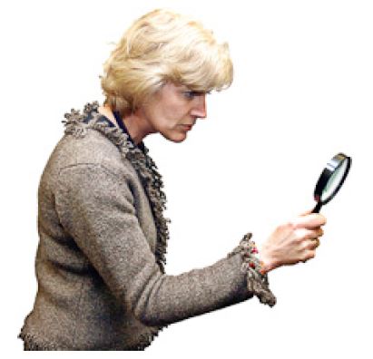 person with a magnifying glass