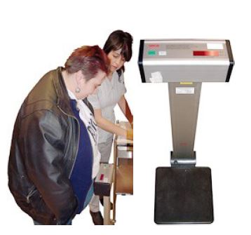 a person standing on scales