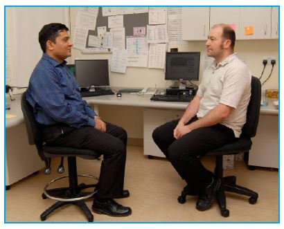 doctor talking to patient