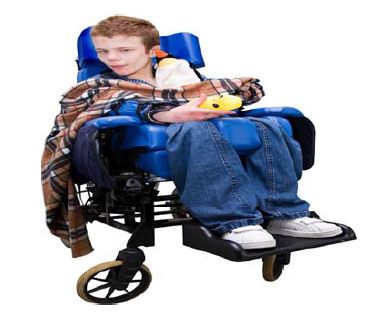person in a wheelchair wearing a large blanket