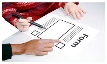 a person filling out a form