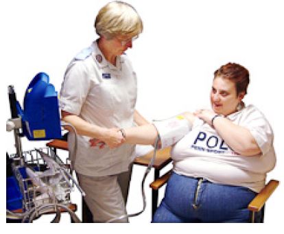 nurse checking blood pressure