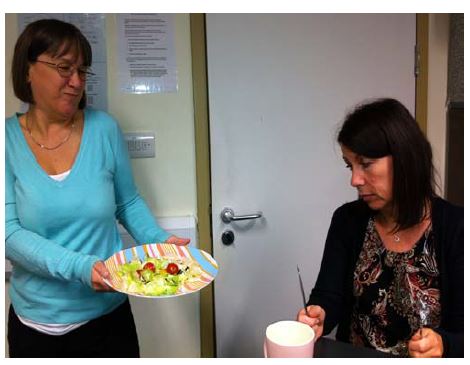 person holding a plate of food