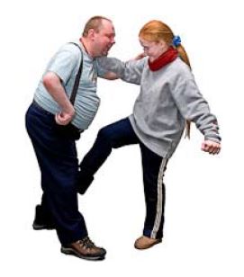 a person kicking another person