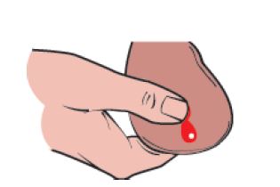 man squeezing his ball with blood showing