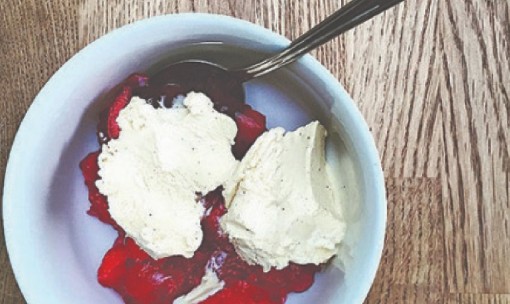 Bowl of jelly and ice cream with a spoon