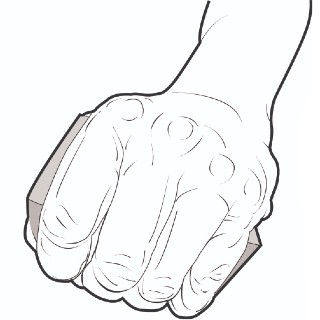 Closed fist squeezing a block as a hand therapy exercise