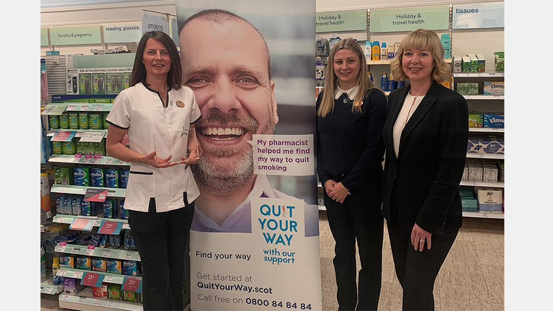 Lisa with award in pharmacy