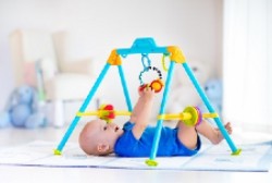 baby on play mat