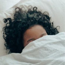 Girl sleeping in bed