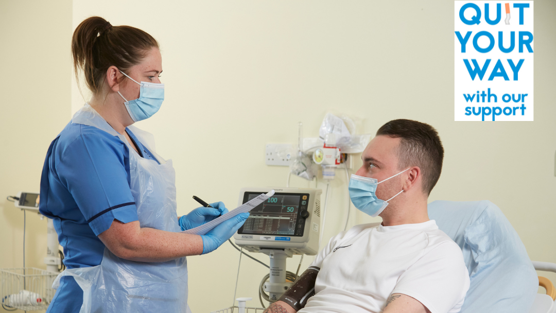 health professional talking to patient in hospital