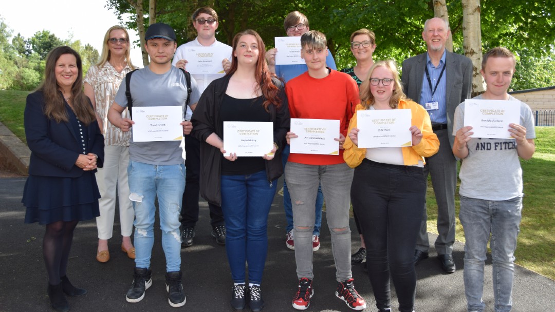 Photograph of Project Search graduates from University Hospital Wishaw along with Chair Martin Hill and chief executive, Professor Jann Gardner