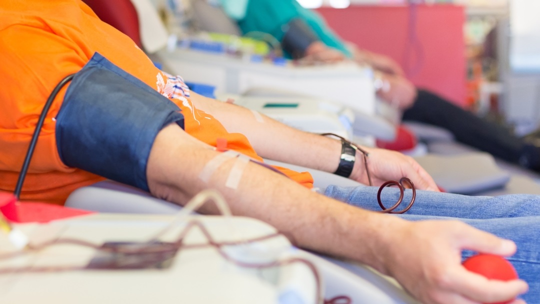 Image of a man receiving a blood transfusion