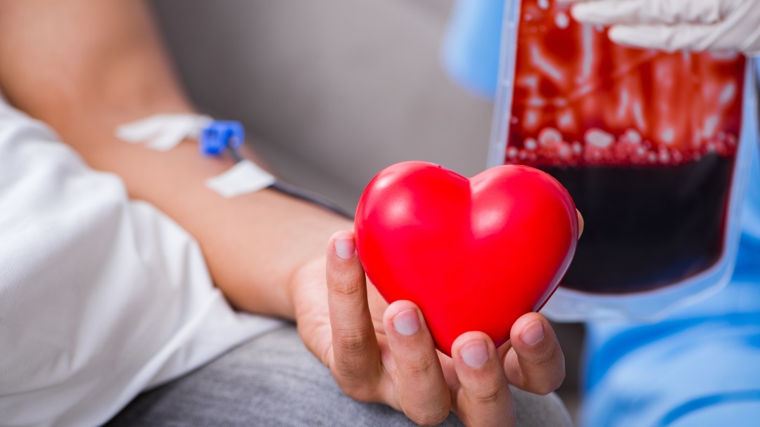 Image of a person receiving a blood transfusion
