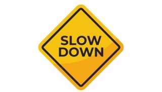 Slow down (image 14) Sign that says "Slow Down"