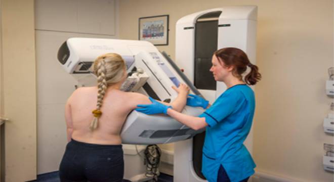 woman having a mammogram