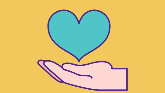 A hand holding a heart 