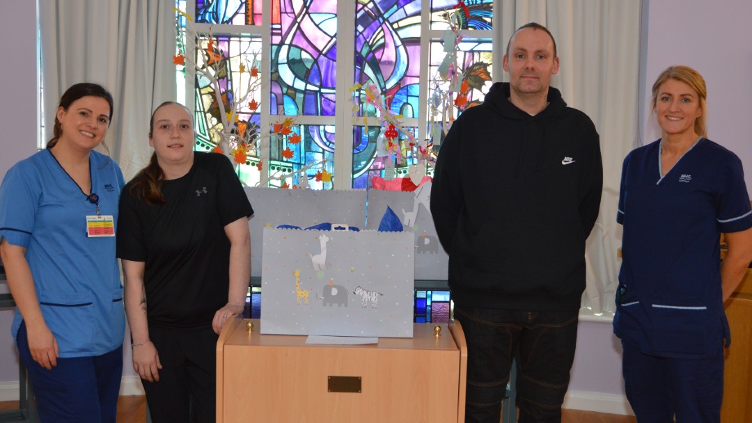 Photograph of Julie Ann Tierney, bereavement specialist midwife, UHW; Nicolle Aitken and partner Steven Bilton and Paula Bentham, senior charge midwife, UHW