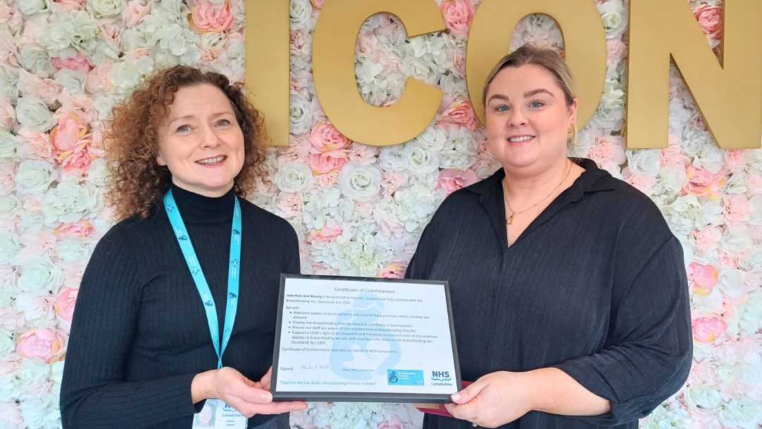 Louise James (left), Health Improvement Practitioner at NHS Lanarkshire, presents a Breastfeeding Friendly certificate to salon owner of Icon Hair and Beauty