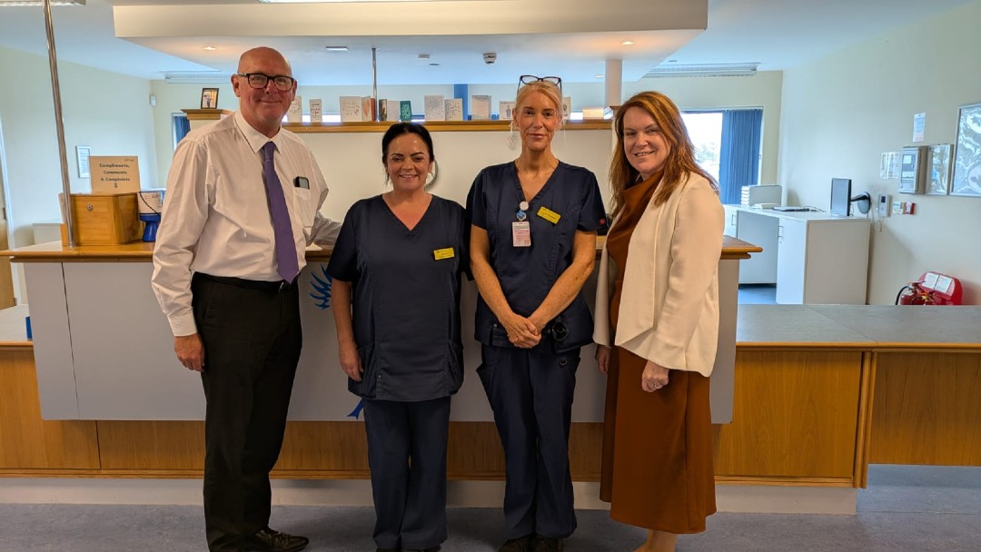 Photograph of Chief Officer of Kilbryde Hospice Gordon McHugh with Kilbryde Hospice nurses, Donna Reilley and Lynn Stewart and NHS Lanarkshire Chief Executive Louise Long