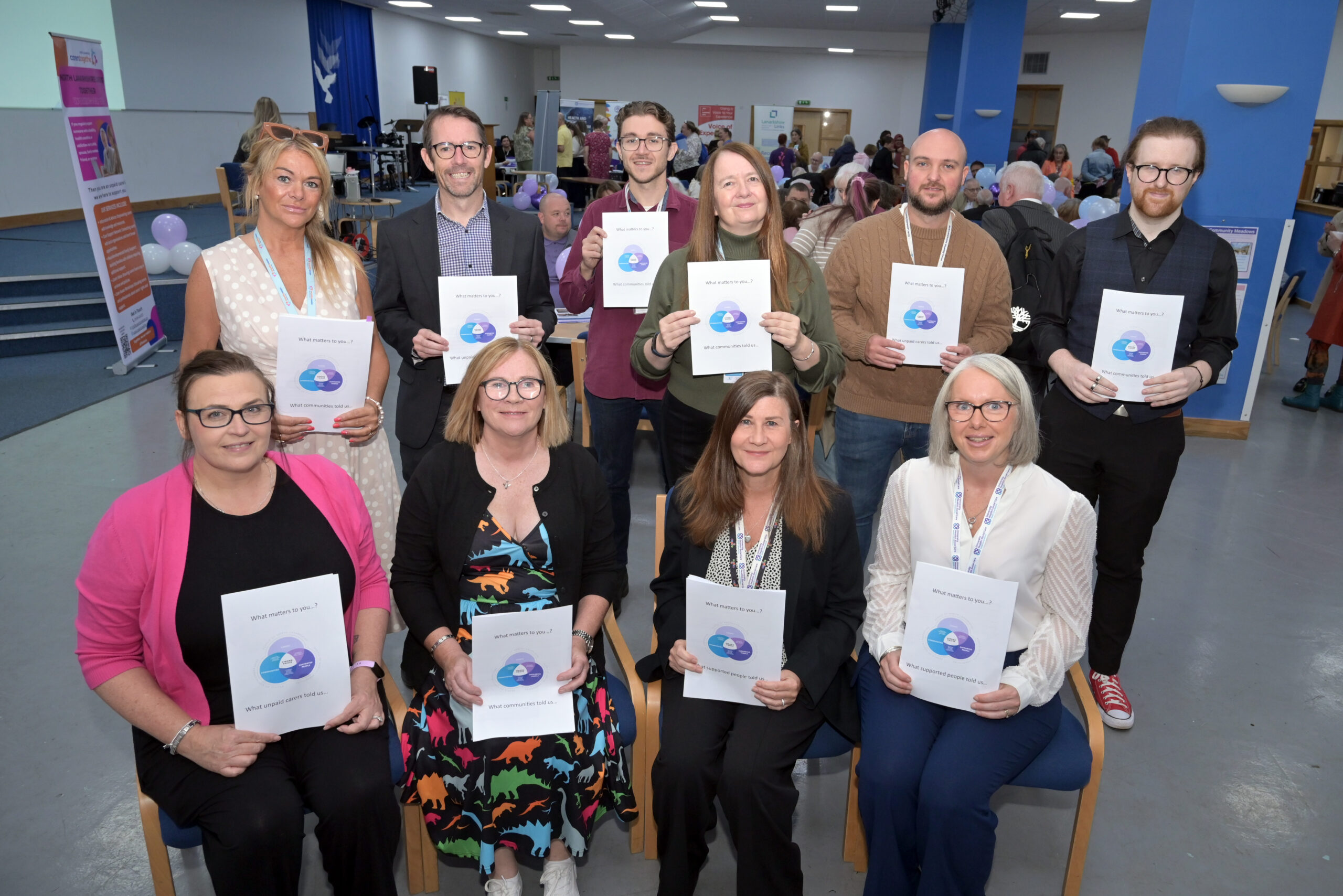 Group of people at University Health & Social Care's Participation Day event.