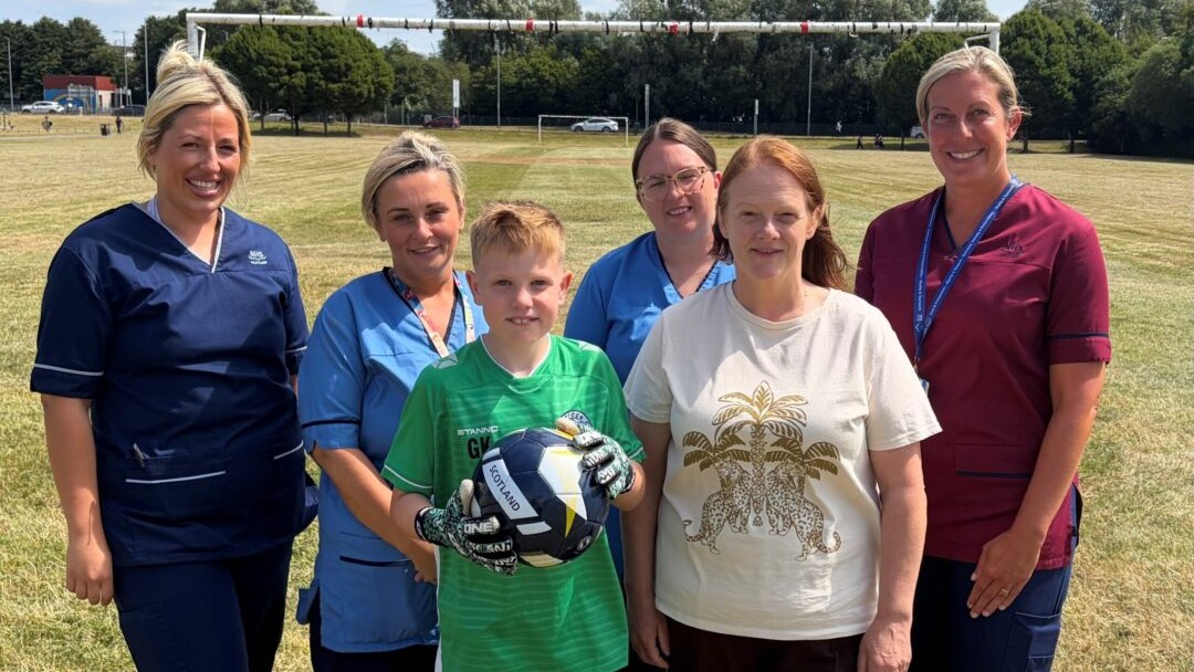 Safe pair of hands: Young goalie tells Minister how Hospital at Home has changed his life